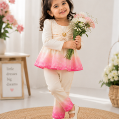 Girl wearing white and pink floral printed co-ord set with full sleeve top and matching pants by Kidaura